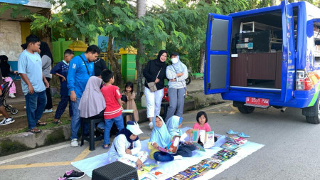 Kegiatan Perpustakaan Keliling di Taman Kota